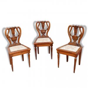 Three antique wooden chairs. Late 1700s.